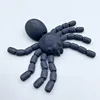 Araña negra de 11.5 cm con atracción magnética.