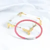 Chiusura in argento + vera pelle di pecora rosa