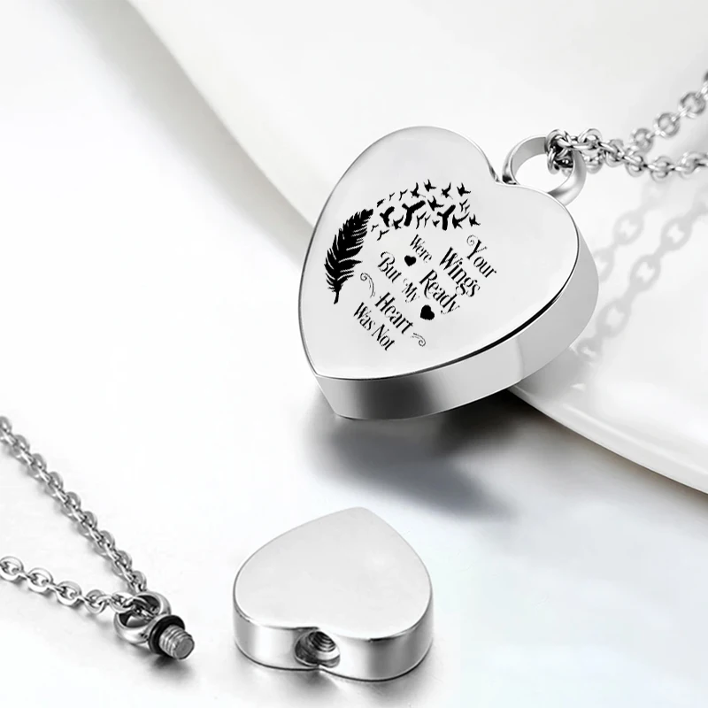 thumbnail image 2 of Large Winged Heart Cremation Urn Necklace With Velvet Pouch & Filling Kit 2 of 5
