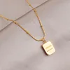 Gold square letter necklace