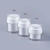 white cream jar with press pump