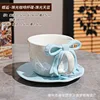 Pearlescent glaze light blue bowknot cup and saucer set
