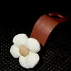 Beige flower [brown hook]