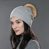 GRAY with brown pom