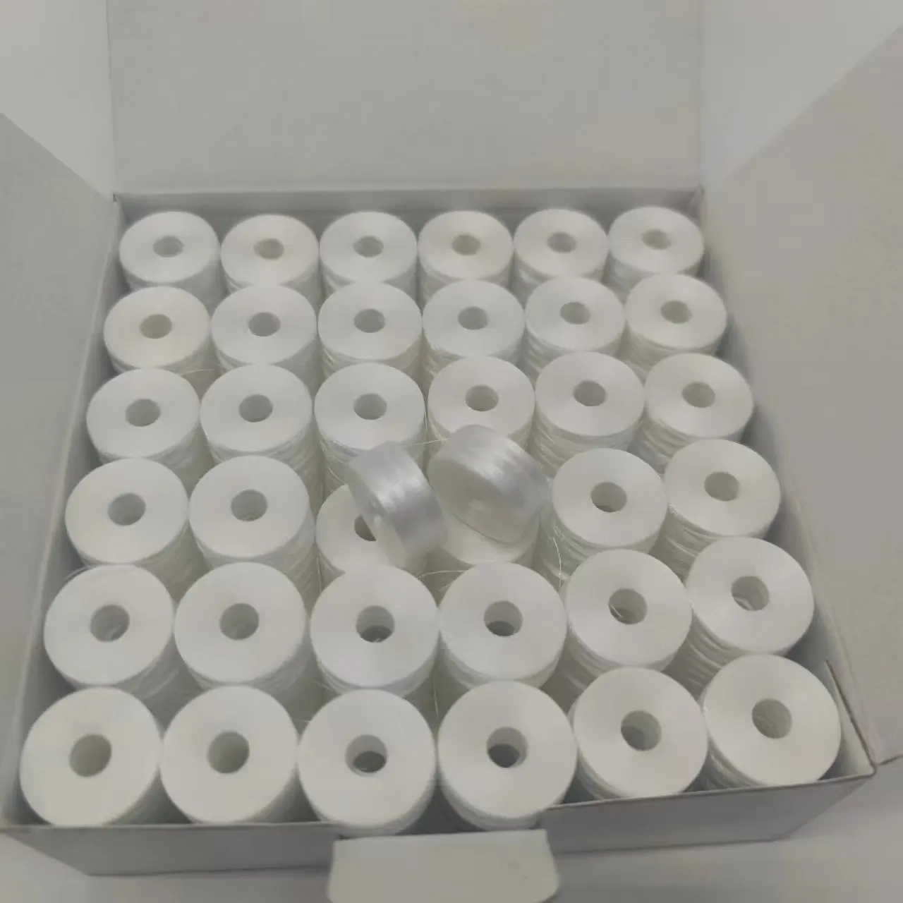 White/ Black 70D/2 Paper side 100% polyester prewound bobbins 144pcs/box  Size L for embroidery bobbin thread - AliExpress