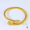 Gold E