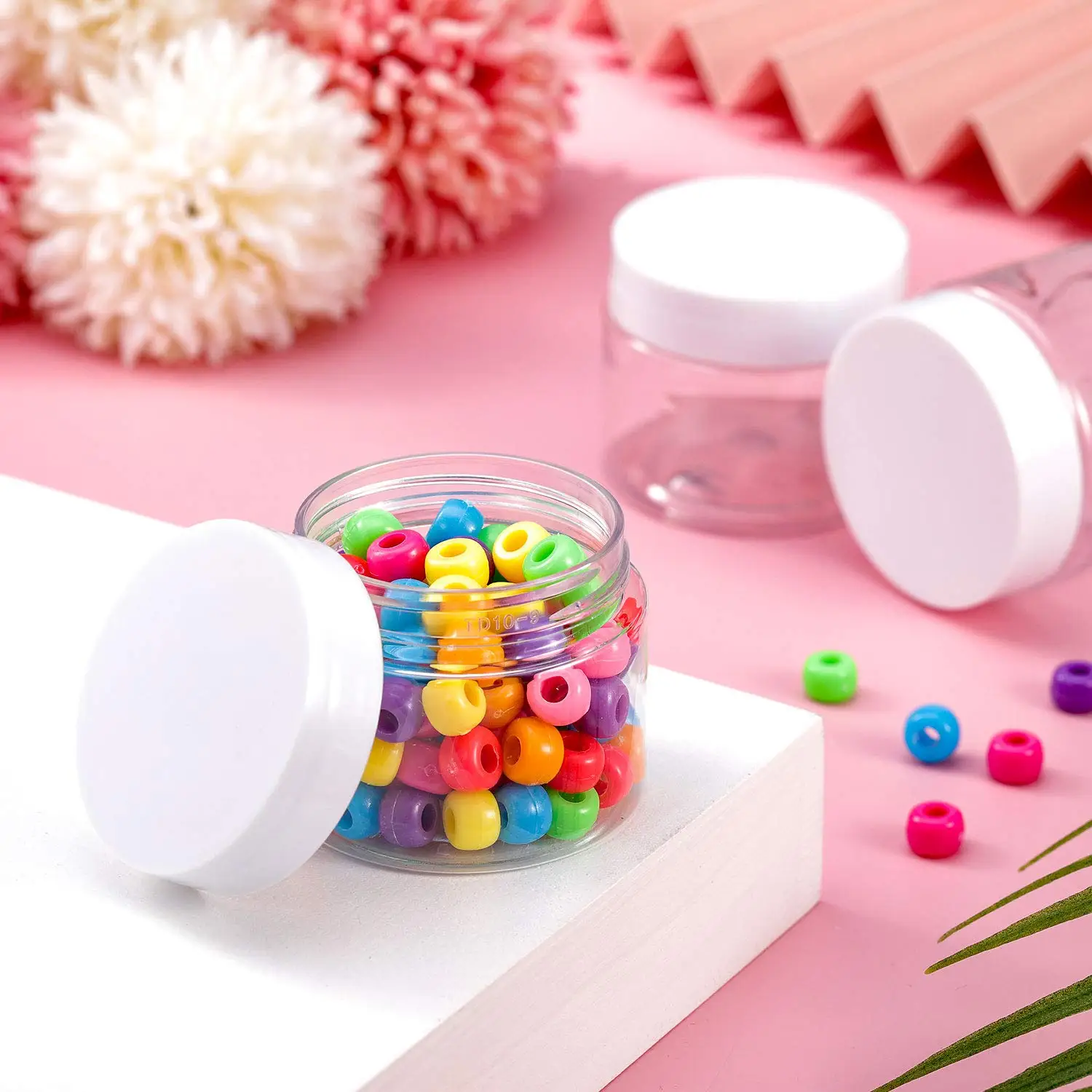 China Supplier 2oz Plastic Pot Jars Round Clear Leak Proof Plastic Cosmetic Container Jars with White Lids for Travel Storage