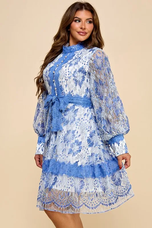 A Short Blue Lace Dress With Blue And White Lace Trim - Image 3