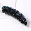 4 green-blue hair clips