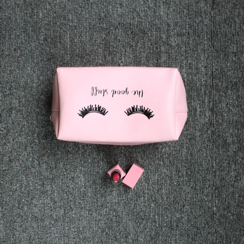 Wholesale Fashion smile design cosmetic bag pink private label