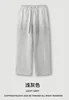 Pantalón deportivo gris claro
