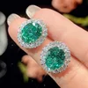 Pendientes de botón Cepala Green con forma de nido de pájaro.