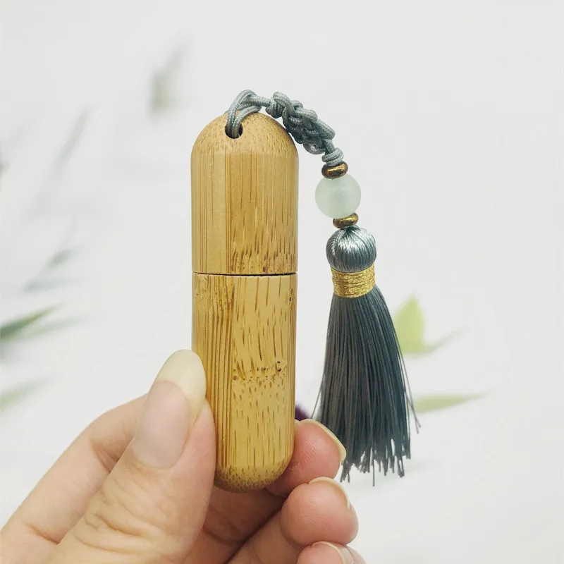 New Style 1ml 2ml 3ml 5ml Cute Refillable Bamboo Roller Bottle Essential Oil with Steel Roller Ball and Tassels