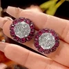 Black gold white diamond stud earrings