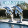 Stainless steel dolphin sculpture