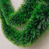 Guirnalda de oropel verde oscuro con ribete verde