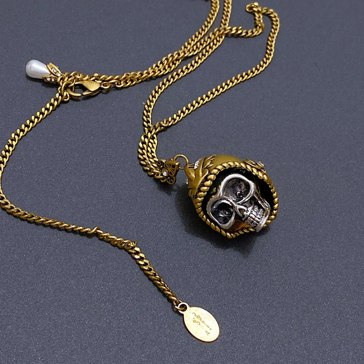 Retro Handheld Skeleton Designer Skull Necklace by Mcqueen
