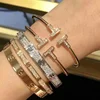 Bracciale Rigido in Oro 18K con Diamanti