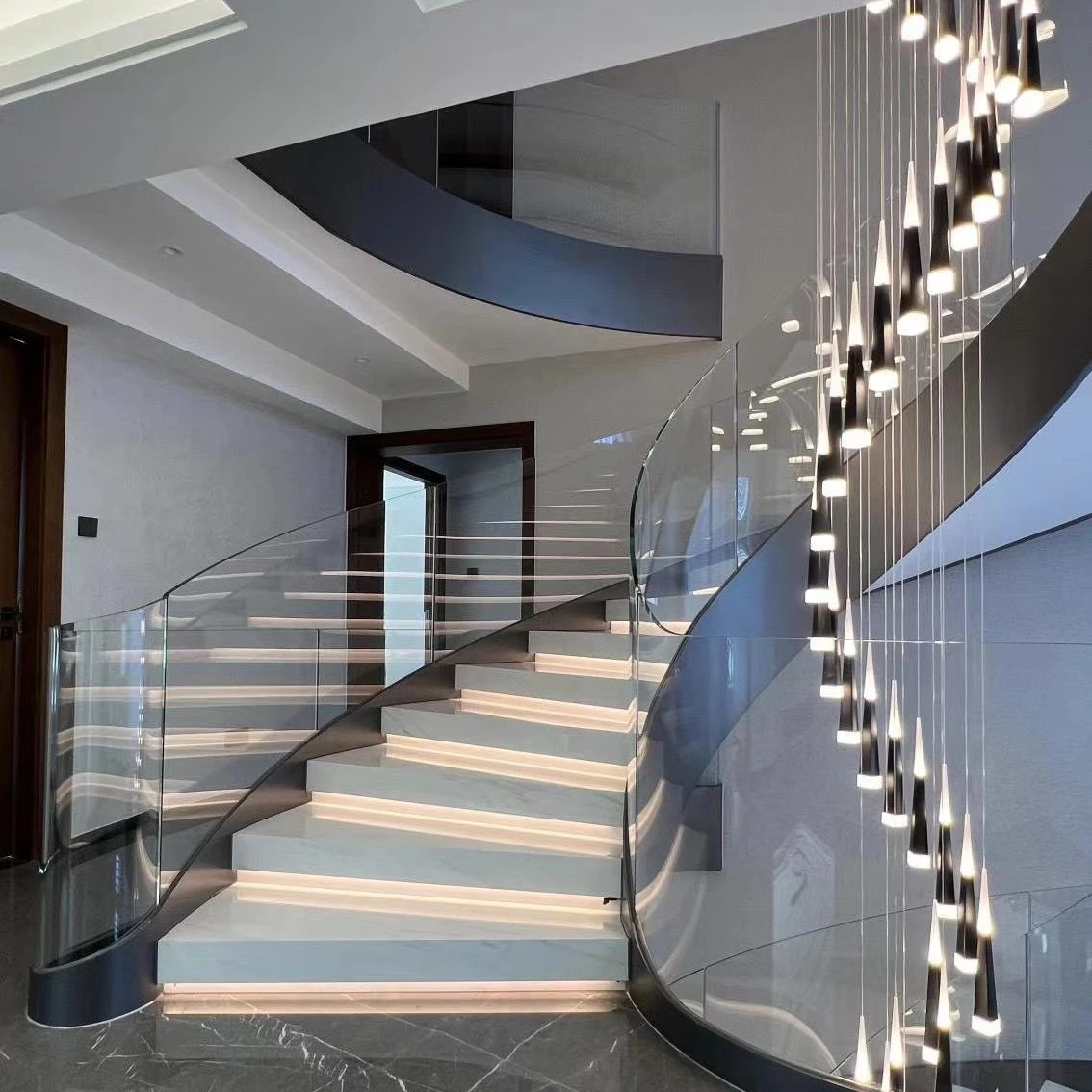 Modern economic indoor steel stairs curved staircase with glass railing marble stair steps decor stairs