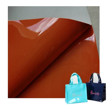 wholesale finished glossy mirror PVC  synthetic leather 0.4 0.5 0.7mm for shopping bag  fire extinguisher bag notebook leather