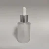 frosted bottle + shiny silver aluminum ring + white rubber head