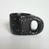 taza de tinta negra