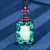 Black gold Parra green pendant with Chopin chain