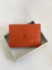 Orange Saturn toothpick pattern card holder
