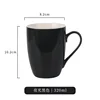 Glossy black drum-shaped cup