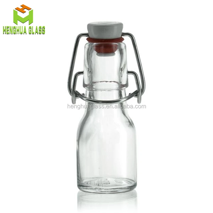 Small Mini 50ml 2oz Round Shape clear Drinks Swing Top Olive Oil Liquid Glass Container Bottle Wholesale