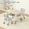 A table and two chairs in wood grain gray.