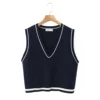 Navy blue knitted vest