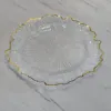 Clear with gold rim