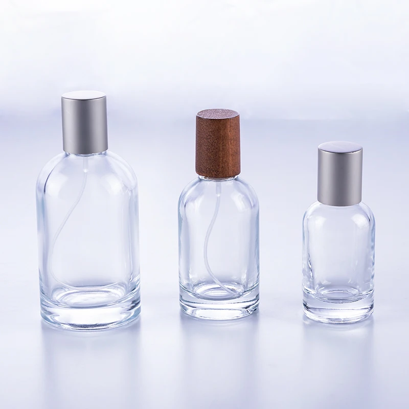 30 ml 50 ml 100 ml Selling Cylinder Round Empty Spray Car Fragrance Perfume Glass Bottle with Wooden Cap and Crimp Top