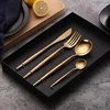 Set di posate in oro da 4 pezzi