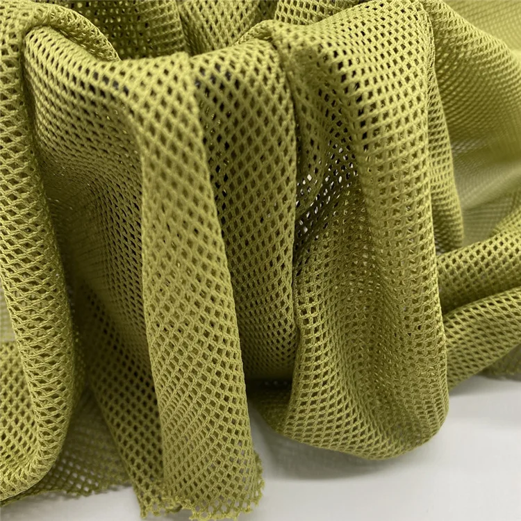 High quality 11*1 100%polyester DTY 75D 120gsm hole mesh fabric for sportswear/lining