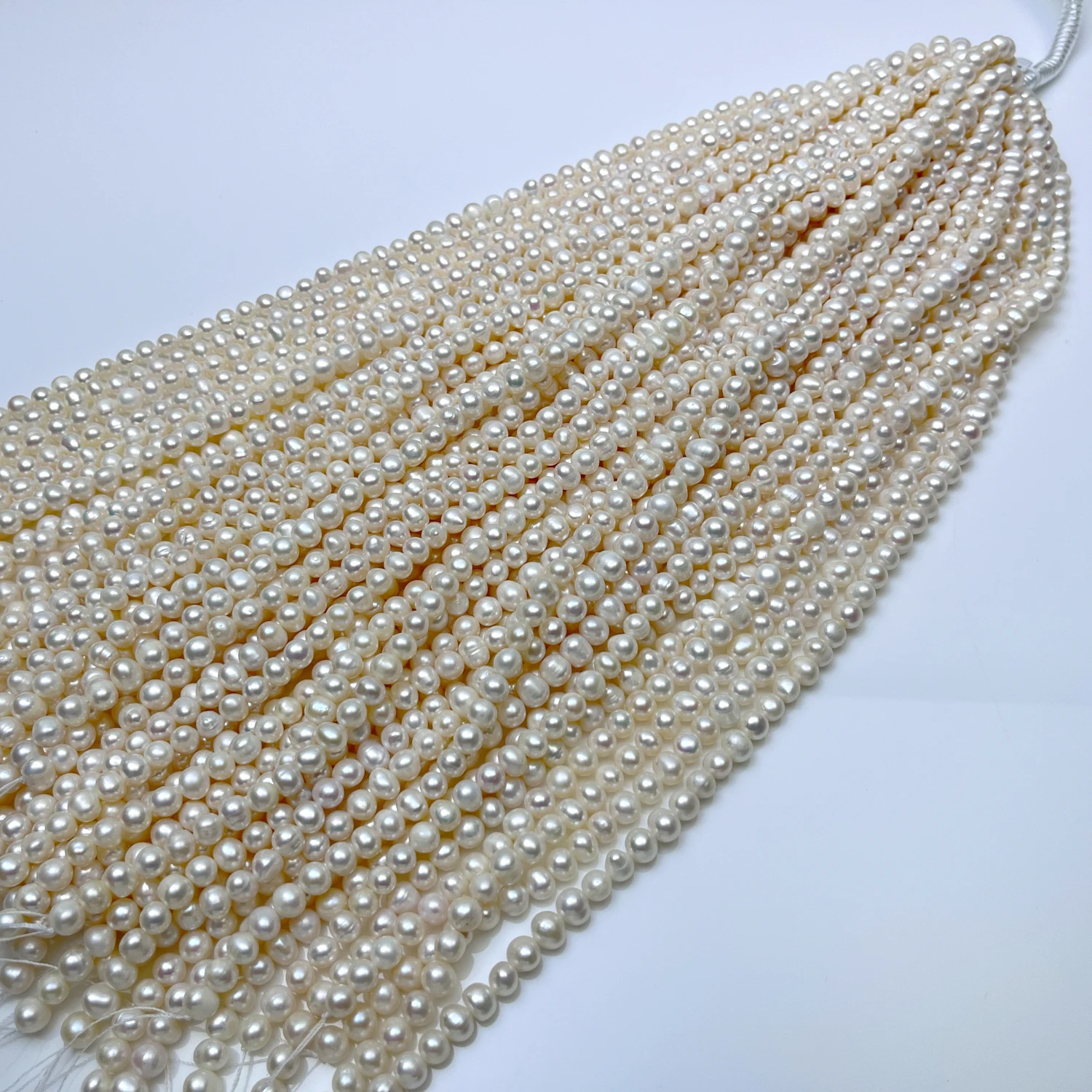 Zhuji Pearl Market Natural White Color 7-8mm Near Round Shape Freshwater Pearl Strands
