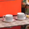 Tasse et soucoupe double, motif ligne noire colorée - 230