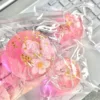 Pompons fleurs de cerisier [sac PVC]