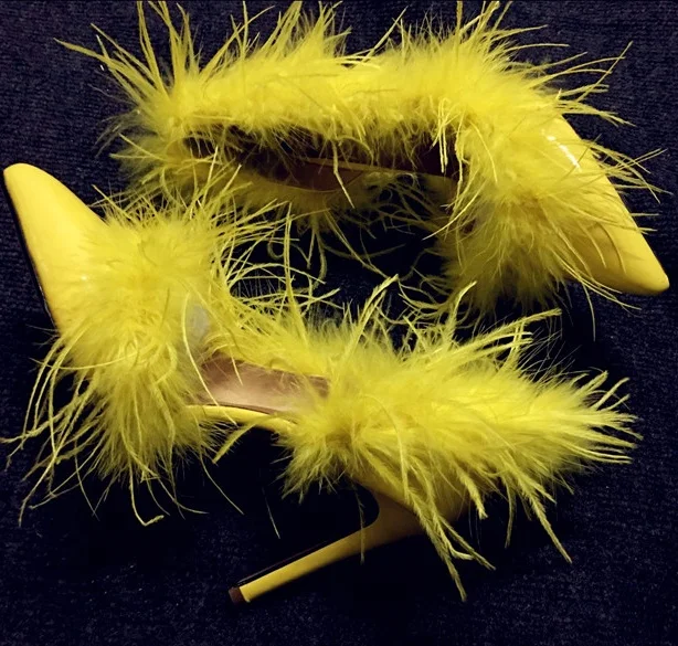 yellow heels with feathers