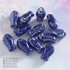 Pez pequeño de cerámica electrochapada con gema azul (1)