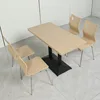 large curved chair surface + black table legs