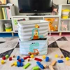 2 square baskets of giraffe and car dinosaur