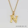 (Gold) letter N (including chain)