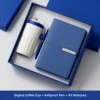 Tasse à café bleue + stylo + carnet