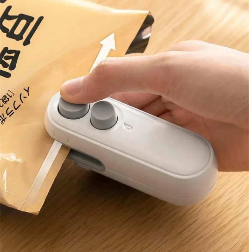 2025 Home Mini Sealing Machine Rechargeable Multi Functional Small Sealing Machine Creative Mini Snack Bag Sealing