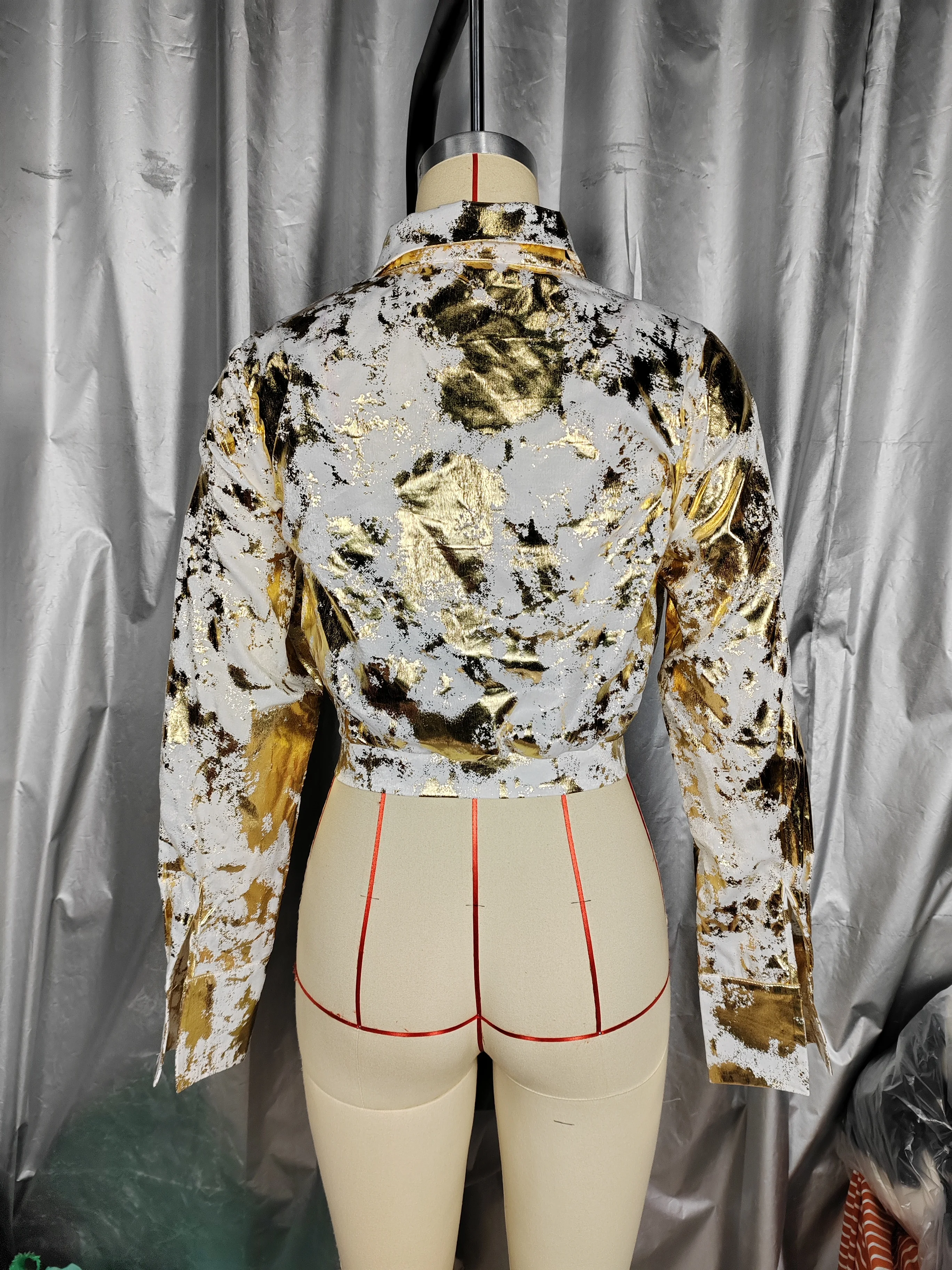 A Fashionable Shirt For Women With Gold Curly Patterns. - Image 2