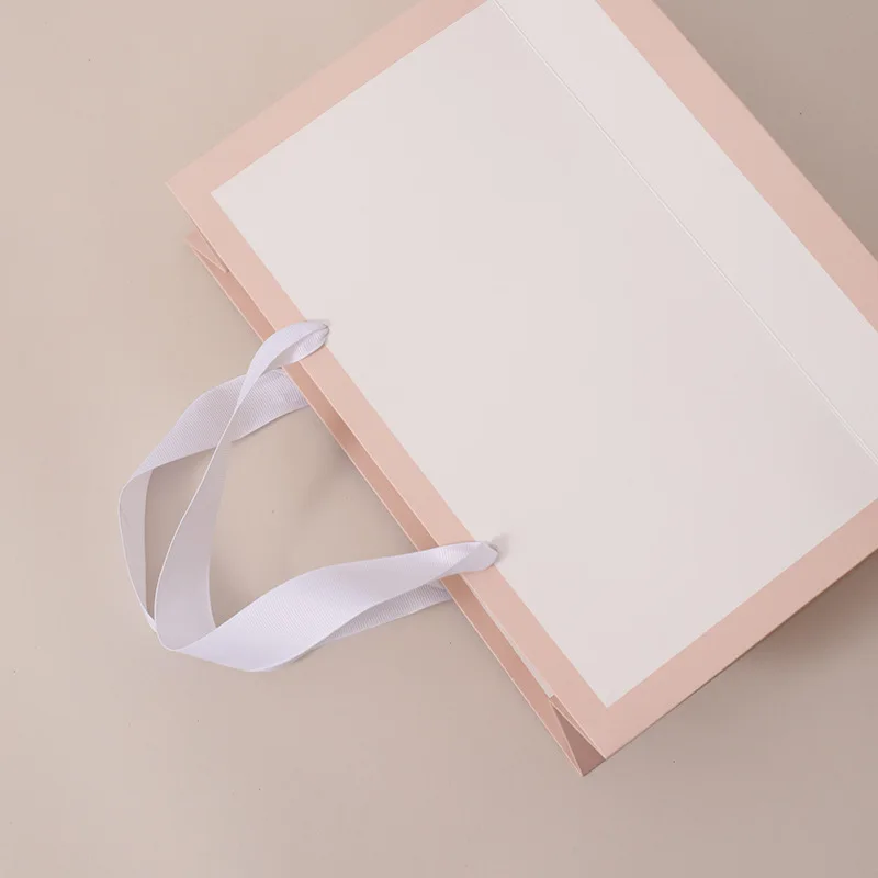 Custom Your Own Logo Printed Recyclable Luxury Paper Bags Packaging Clothing Shopping Paper Bag With White Ribbon Handle