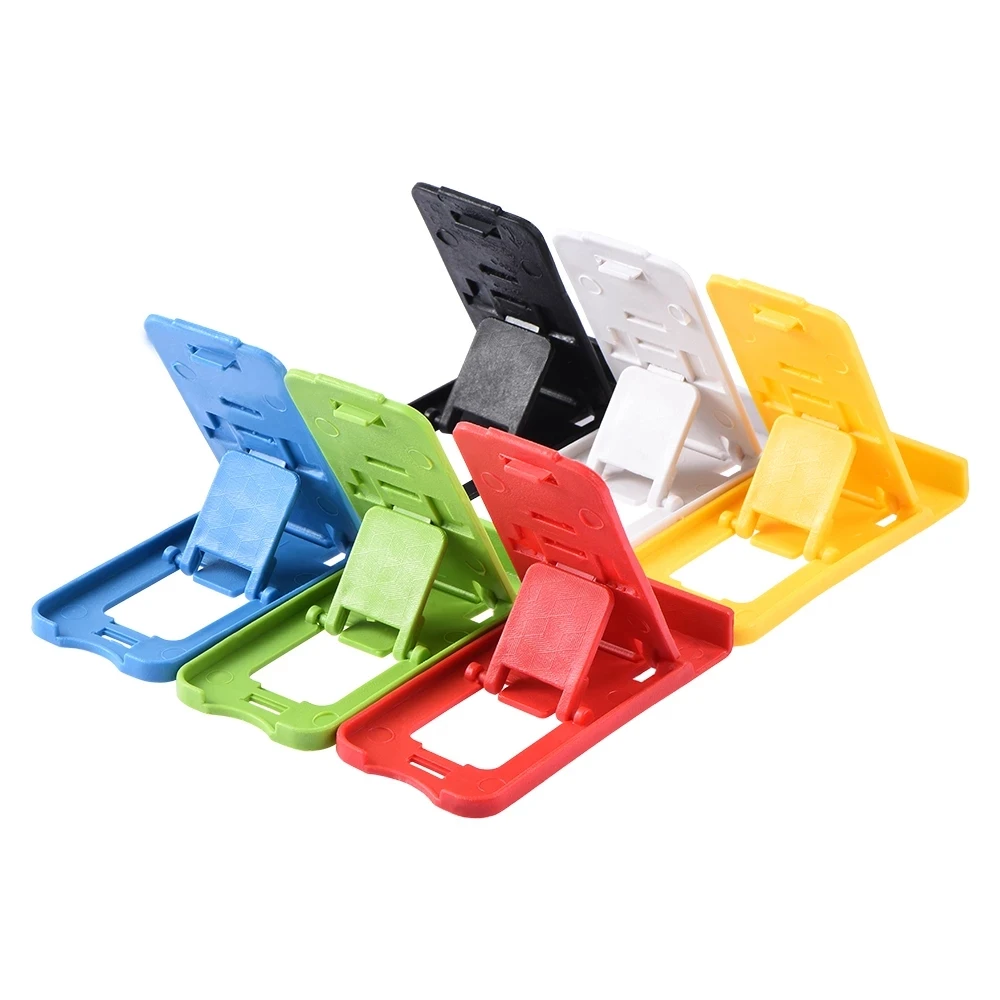 Foldable universal adjustable mobile phone holder