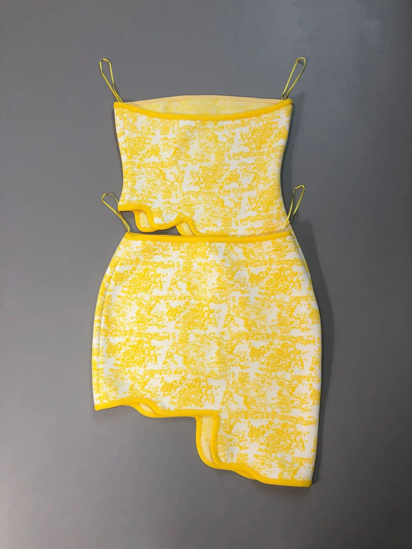 Close-up of asymmetric mini skirt set